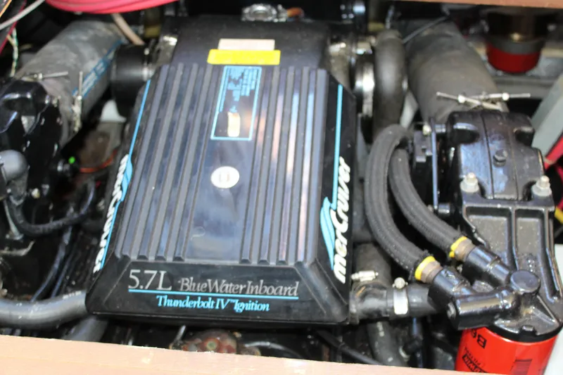 Slide: The Image of Engine of 1990 Carver 3207 Aft Cabin Motor Yacht, featuring 5.7L BlueWater Inboard. - 31