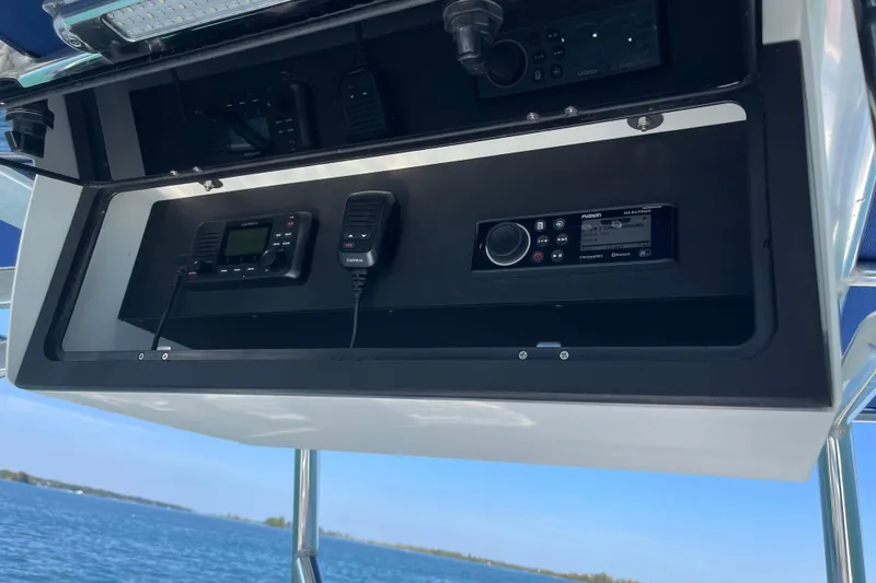 Slide: The Image of 2023 Bluewater Sportfishing 23t boat console with Garmin and Fusion electronics. - 12