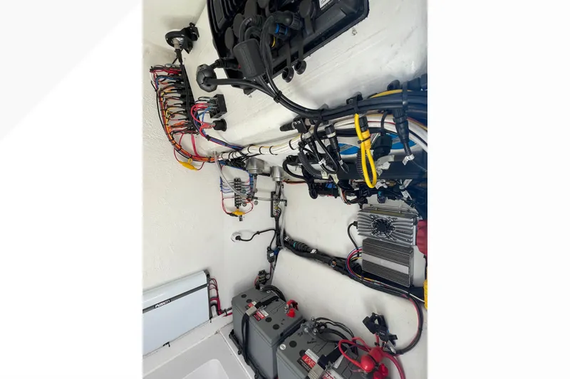 Slide: The Image of 2023 Bluewater Sportfishing 23t boat wiring and electrical components setup. - 16