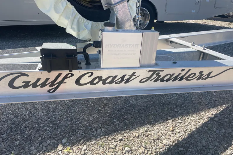 Slide: The Image of Trailer with "Gulf Coast Trailers" branding, featuring Hydrastar brake actuator. Bluewater Sportfishing 23t, 2023. - 25