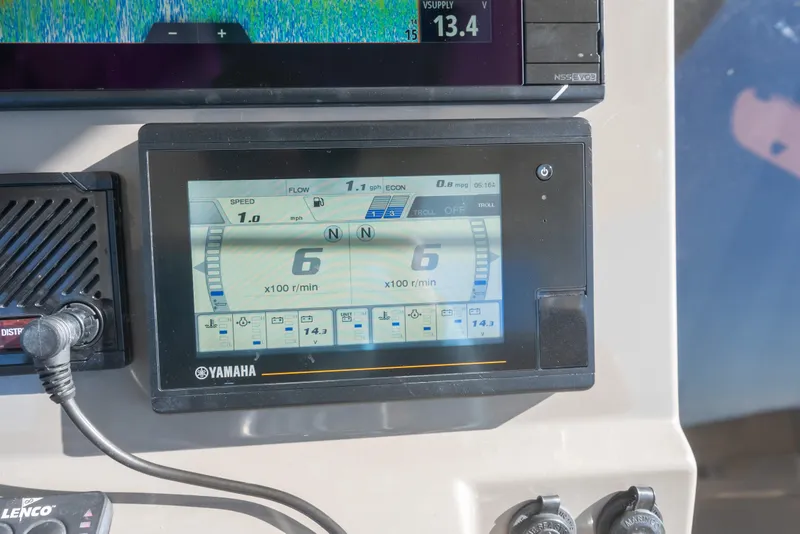 Slide: The Image of Yamaha display on 2018 Pursuit S 328 Sport boat dashboard showing engine metrics. - 37
