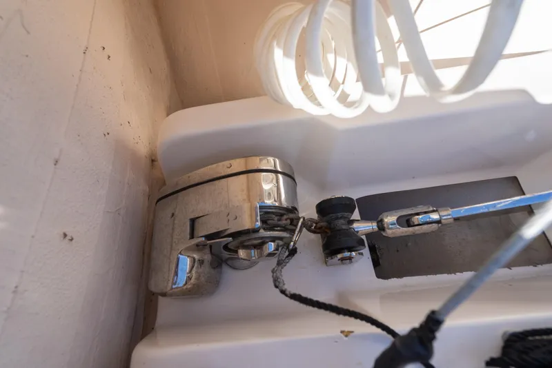 Slide: The Image of 2018 Pursuit S 328 Sport boat detail showing winch and coiled rope. - 46