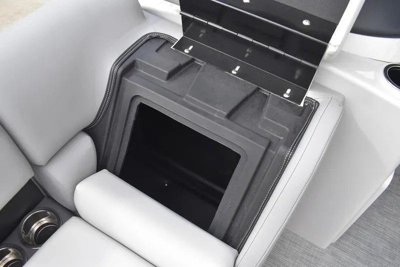 Slide: The Image of Open storage compartment in 2026 Lowe SS 230 WT Special boat interior. - 11