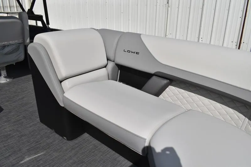Slide: The Image of 2026 Lowe SS 230 WT Special boat interior with gray seating and quilted accents. - 18