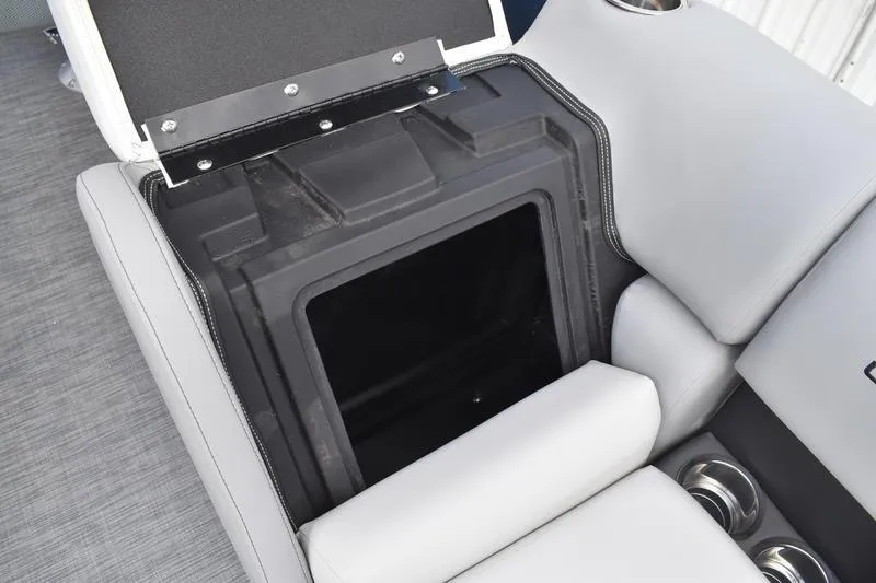 Slide: The Image of Open storage compartment in 2026 Lowe SS 230 WT Special boat seat. - 21