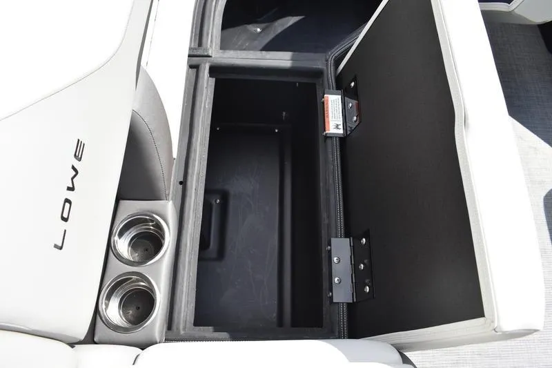 Slide: The Image of Interior storage compartment of 2026 Lowe SS 230 WT Special boat with cup holders. - 23