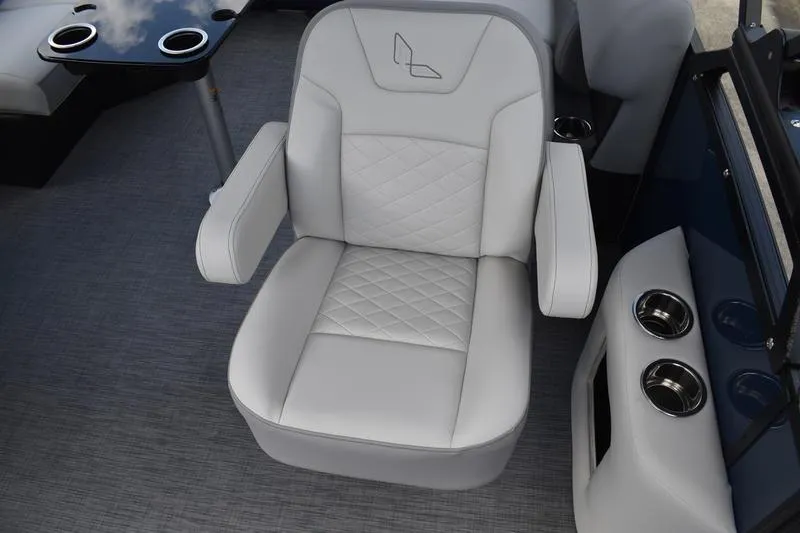 Slide: The Image of Luxurious seating on 2026 Lowe SS 230 WT Special boat, featuring elegant design and cup holders. - 26
