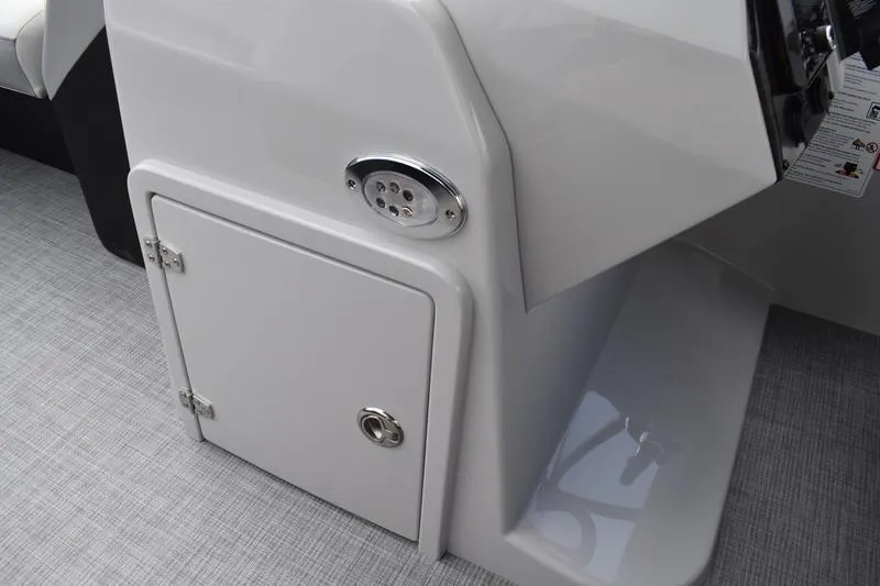 Slide: The Image of 2026 Lowe SS 230 WT Special boat console with storage compartment and sleek design. - 30