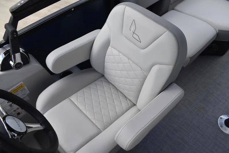 Slide: The Image of Luxurious seating in 2026 Lowe SS 230 WT Special boat, featuring quilted upholstery and armrests. - 37