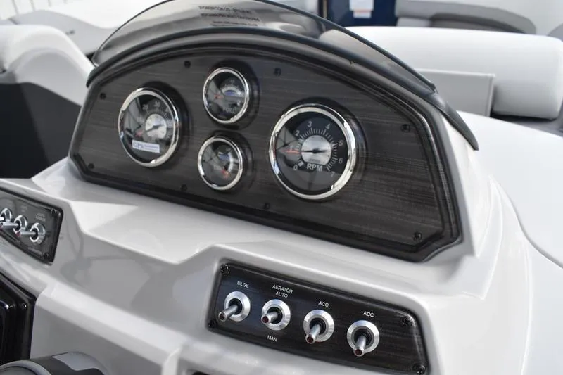 Slide: The Image of Dashboard of 2026 Lowe SS 230 WT Special boat with gauges and controls. - 40