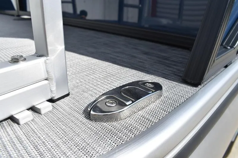 Slide: The Image of 2026 Lowe SS 230 WT Special boat deck with metal cleat detail. - 8