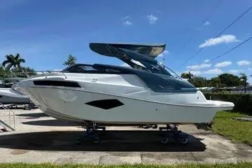 The Image of 2025 NX Boats NX290 Exclusive yacht displayed outdoors on a sunny day. - 1