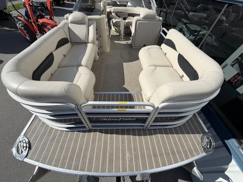Slide: The Image of 2014 Godfrey Aqua Patio CB 240 pontoon boat with beige seating. - 4