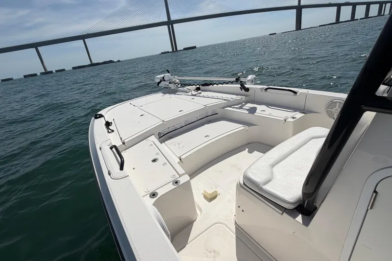 Slide: The Image of 2020 Sea Cat 260 boat on water near a large bridge, sunny day. - 17