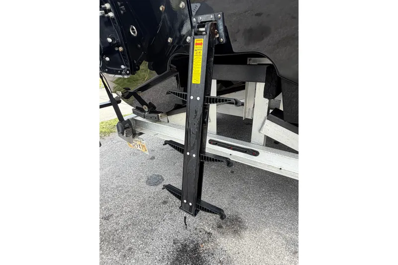 Slide: The Image of Rear view of a 2020 Sea Cat 260 boat on a trailer, showing the ladder and hull. - 20