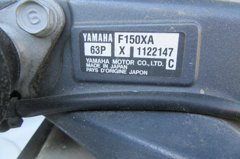 Slide: The Image of Yamaha F150XA engine label on 2013 Sea Hunt Ultra 211 boat, made in Japan. - 5