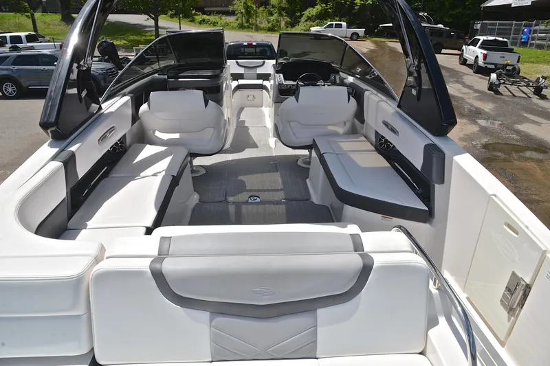 Slide: The Image of 2018 Chaparral 287 SSX boat interior with luxurious seating and modern design. - 19