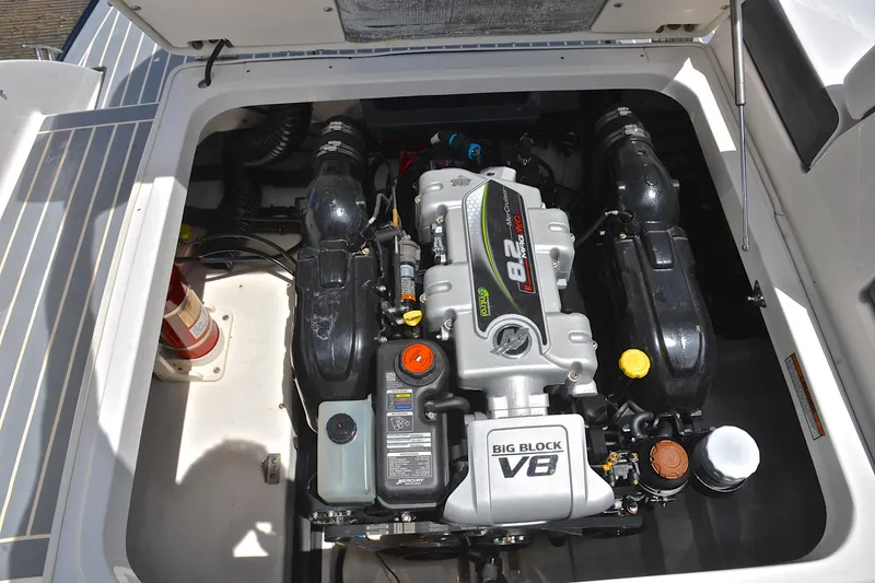 Slide: The Image of 2018 Chaparral 287 SSX boat engine compartment with Mercury 8.2L V8 engine. - 33