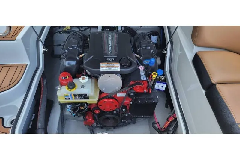 Slide: The Image of 2024 Crownline Eclipse E235 engine compartment with Volvo Penta V8 engine. - 11