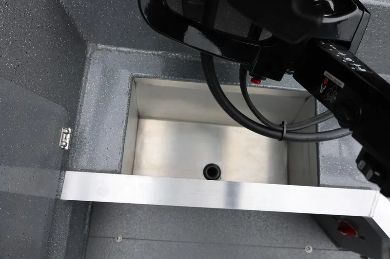 Slide: The Image of Interior view of 2025 Thunder Jet 209 Rush OT boat, featuring a storage compartment. - 10