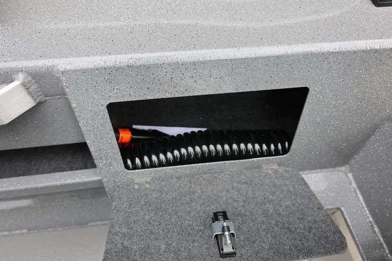 Slide: The Image of Storage compartment in 2025 Thunder Jet 209 Rush OT boat. - 11