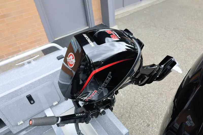 Slide: The Image of Mercury outboard motor on 2025 Thunder Jet 209 Rush OT boat, close-up view. - 12