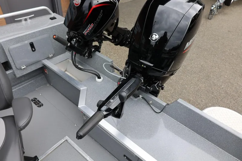 Slide: The Image of 2025 Thunder Jet 209 Rush OT boat interior with dual outboard motors. - 15