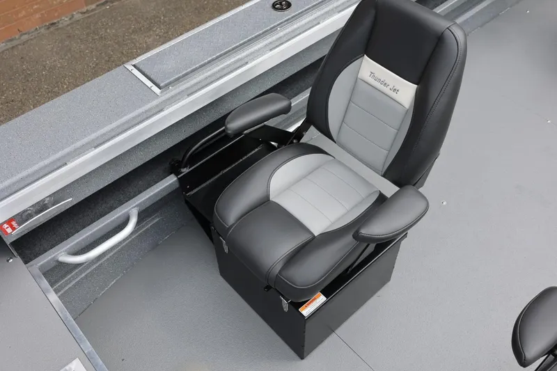 Slide: The Image of Captain's seat in 2025 Thunder Jet 209 Rush OT boat, featuring sleek design and comfort. - 37