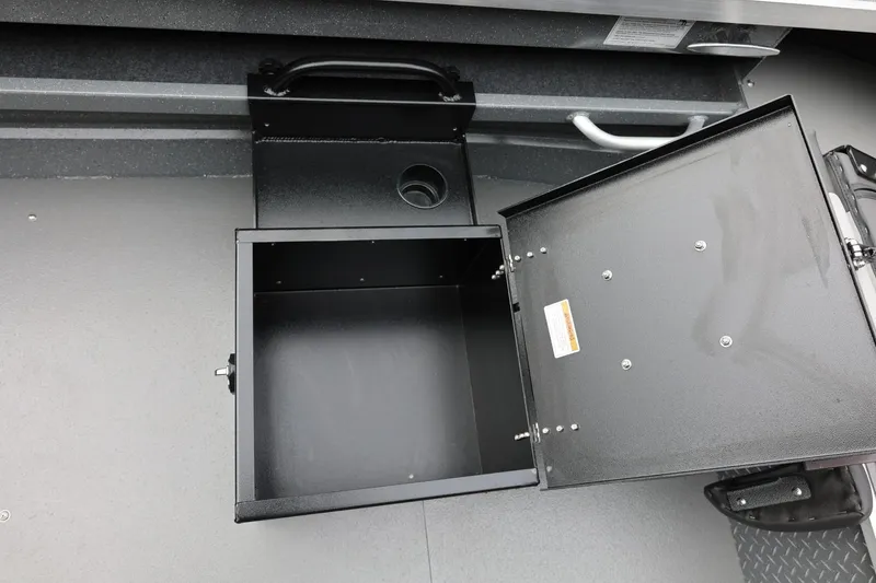 Slide: The Image of Open storage compartment in 2025 Thunder Jet 209 Rush OT boat. - 39