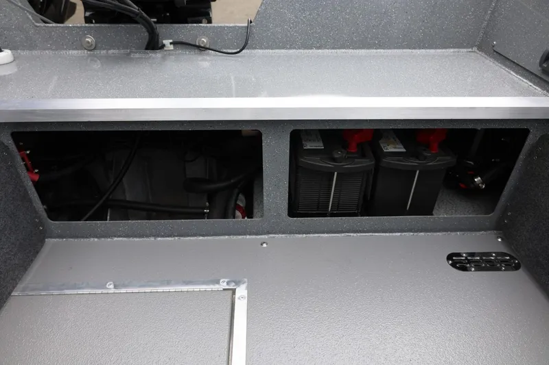 Slide: The Image of Interior view of 2025 Thunder Jet 209 Rush OT boat's battery compartment. - 5