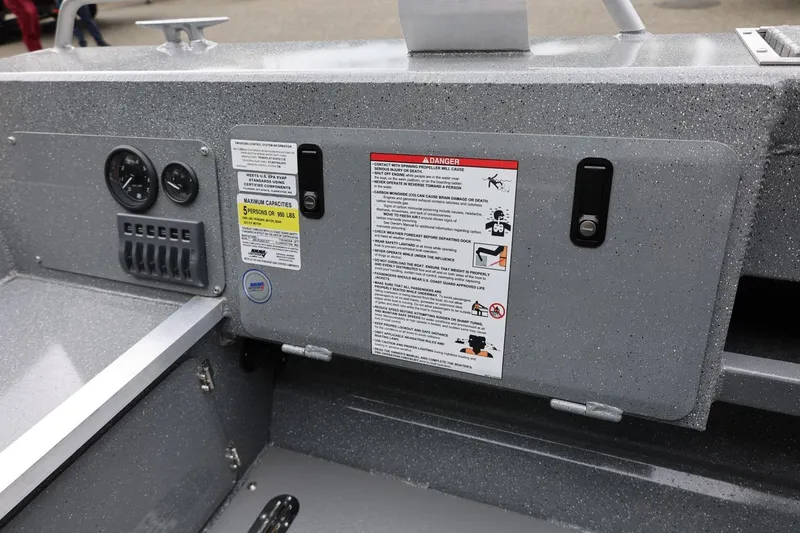 Slide: The Image of Control panel of 2025 Thunder Jet 209 Rush OT boat with safety warnings and gauges. - 6