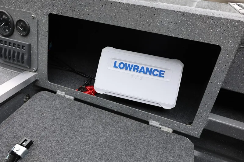 Slide: The Image of Storage compartment in 2025 Thunder Jet 209 Rush OT with Lowrance device. - 7