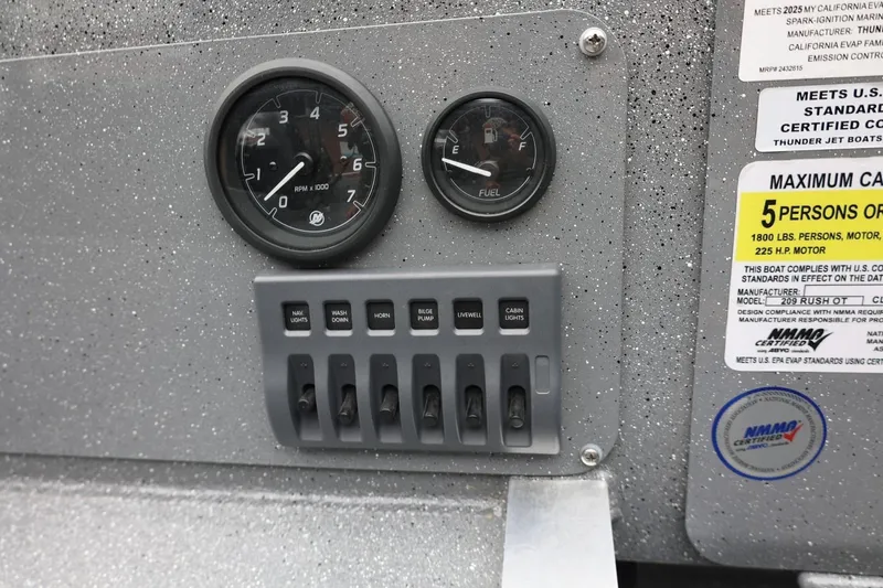 Slide: The Image of Dashboard of 2025 Thunder Jet 209 Rush OT boat with gauges and switches. - 8