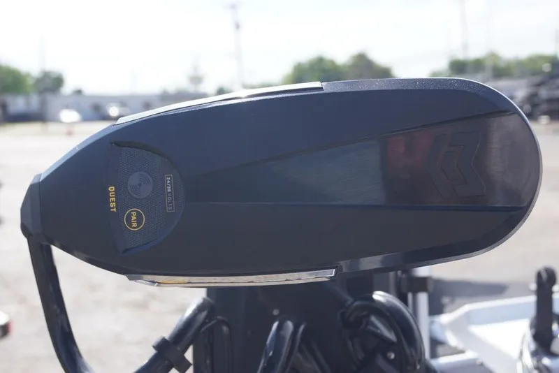 Slide: The Image of Close-up of a 2026 Phoenix 721 ZXL boat motor component outdoors. - 10