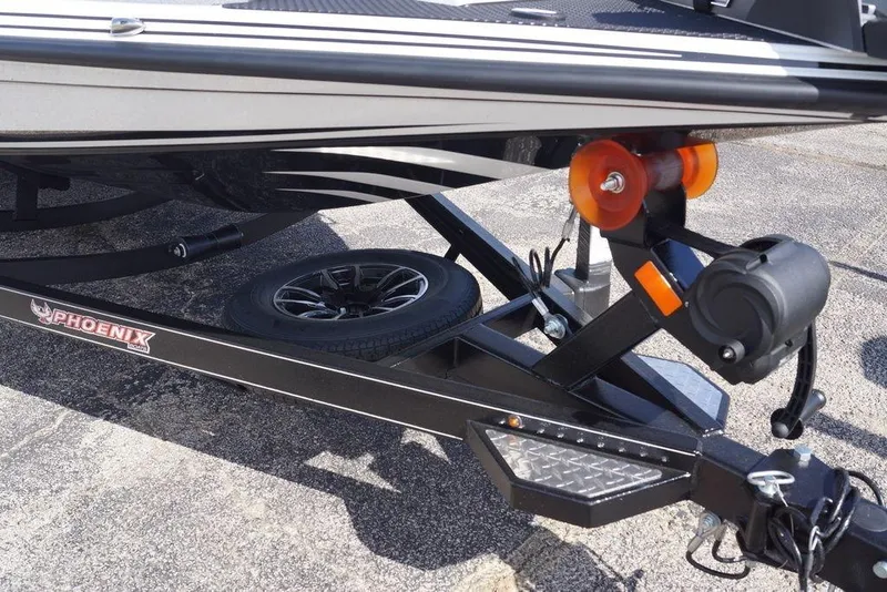 Slide: The Image of 2026 Phoenix 721 ZXL boat trailer with spare tire and winch system. - 3
