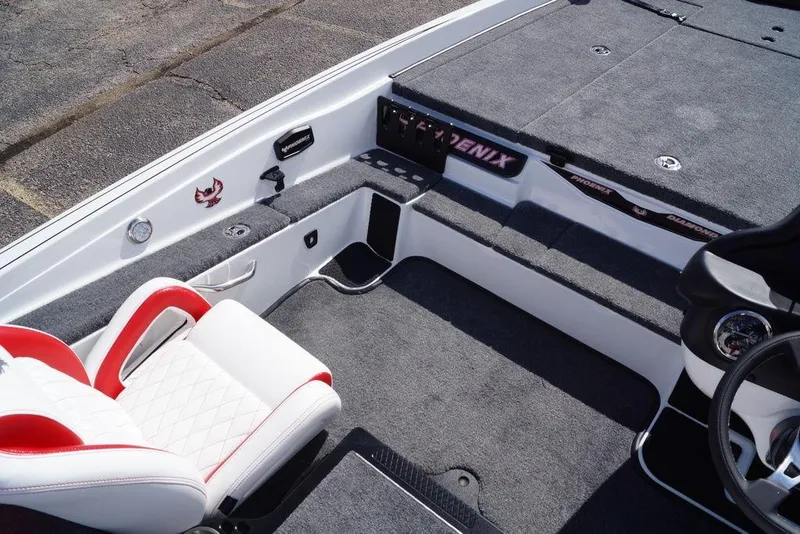Slide: The Image of Interior of 2026 Phoenix 721 ZXL boat with red and white seating. - 7