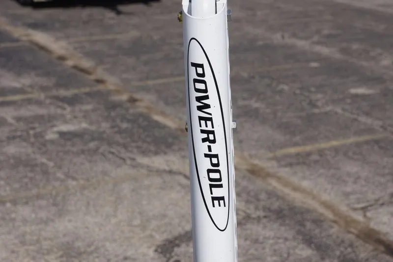 Slide: The Image of Power-Pole anchor on Phoenix 721 ZXL, 2026 model, in a parking lot setting. - 9