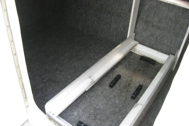 Slide: The Image of Interior storage compartment of a 2006 Sea Ray 240 Sundeck boat. - 19