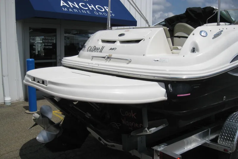 Slide: The Image of 2006 Sea Ray 240 Sundeck boat at Anchor Marine Group dealership. - 5