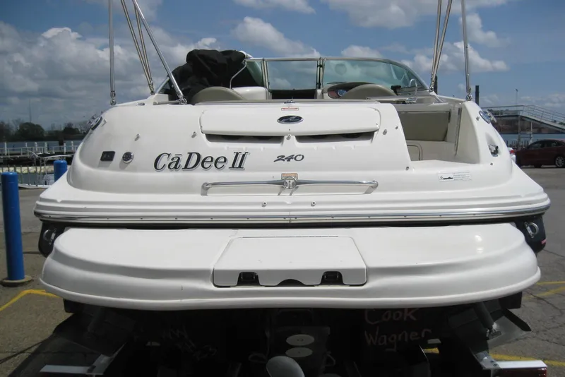Slide: The Image of 2006 Sea Ray 240 Sundeck boat named "CaDee II" docked at marina. - 6