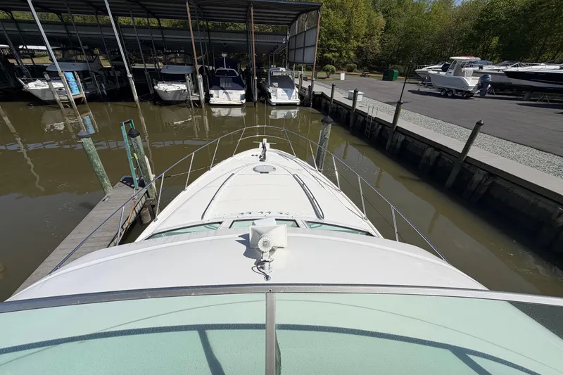 Slide: The Image of 2001 Maxum 4600 SCB Limited Edition yacht docked at marina. - 20