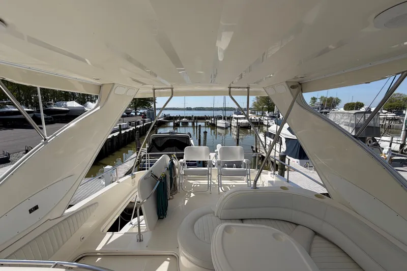 Slide: The Image of Luxurious 2001 Maxum 4600 SCB yacht interior with marina view. - 22