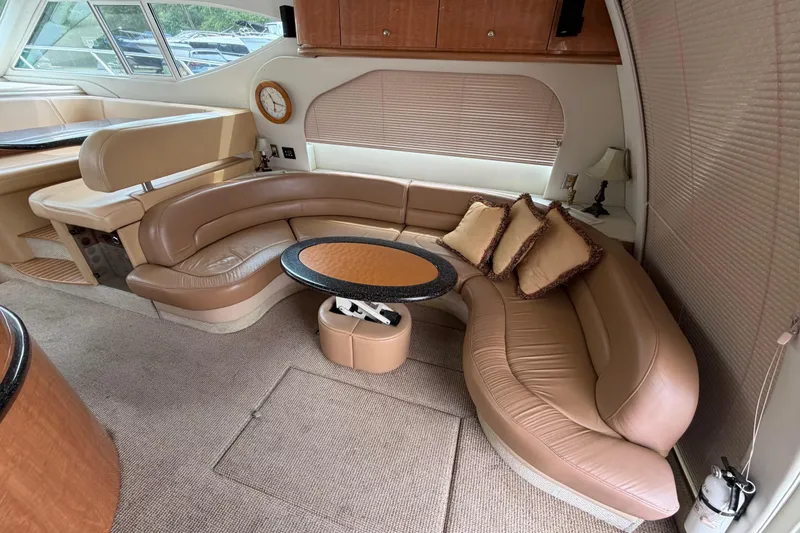 Slide: The Image of Luxurious interior of 2001 Maxum 4600 SCB yacht with plush seating and elegant decor. - 25