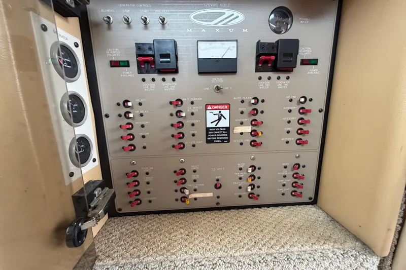 Slide: The Image of Electrical control panel of a 2001 Maxum 4600 SCB Limited Edition boat. - 29
