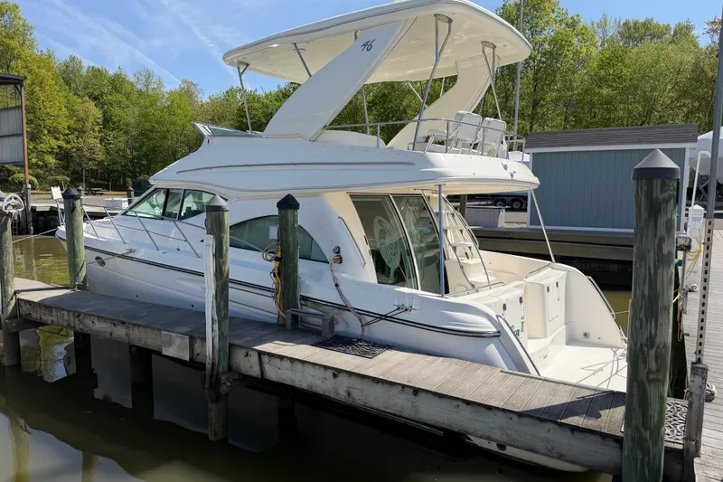 Slide: The Image of 2001 Maxum 4600 SCB Limited Edition yacht docked at marina. - 3