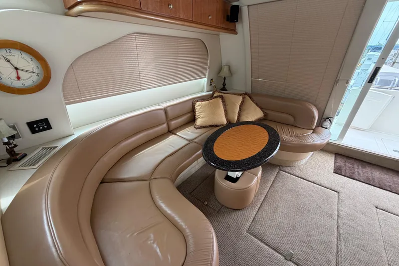 Slide: The Image of Luxurious interior of 2001 Maxum 4600 SCB yacht with plush seating and elegant decor. - 40