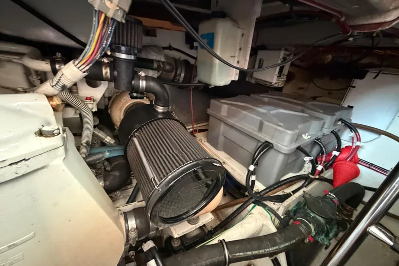 Slide: The Image of Engine room of 2001 Maxum 4600 SCB Limited Edition yacht, showcasing mechanical components. - 47
