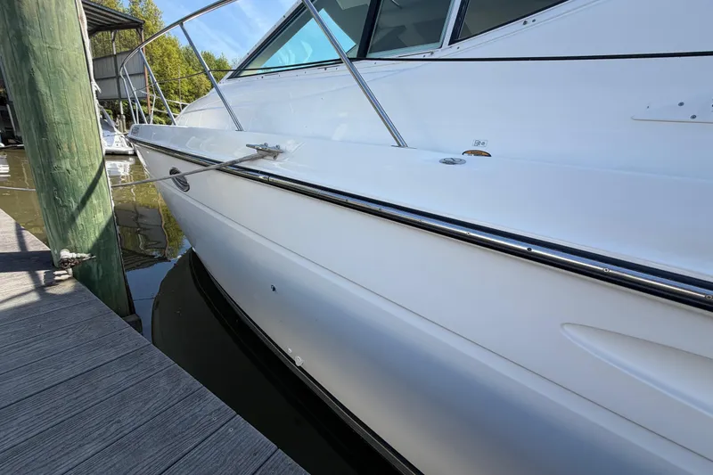 Slide: The Image of 2001 Maxum 4600 SCB Limited Edition yacht docked at marina. - 6