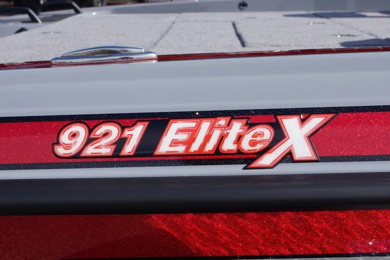 Slide: The Image of Phoenix 921 Elite X 2026 model logo on a sleek red surface. - 12