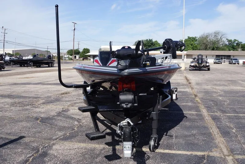 Slide: The Image of 2026 Phoenix 921 Elite X boat on trailer in parking lot, front view. - 2
